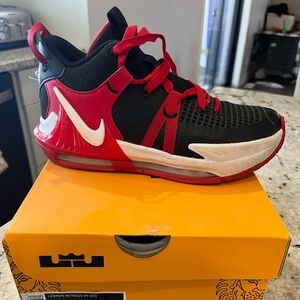 Nike- Lebron James witness sneaker size 4-big boy